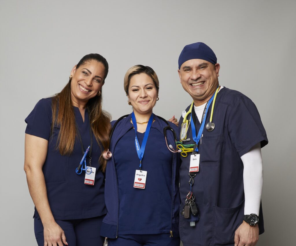 Three smiling BBD staff members.